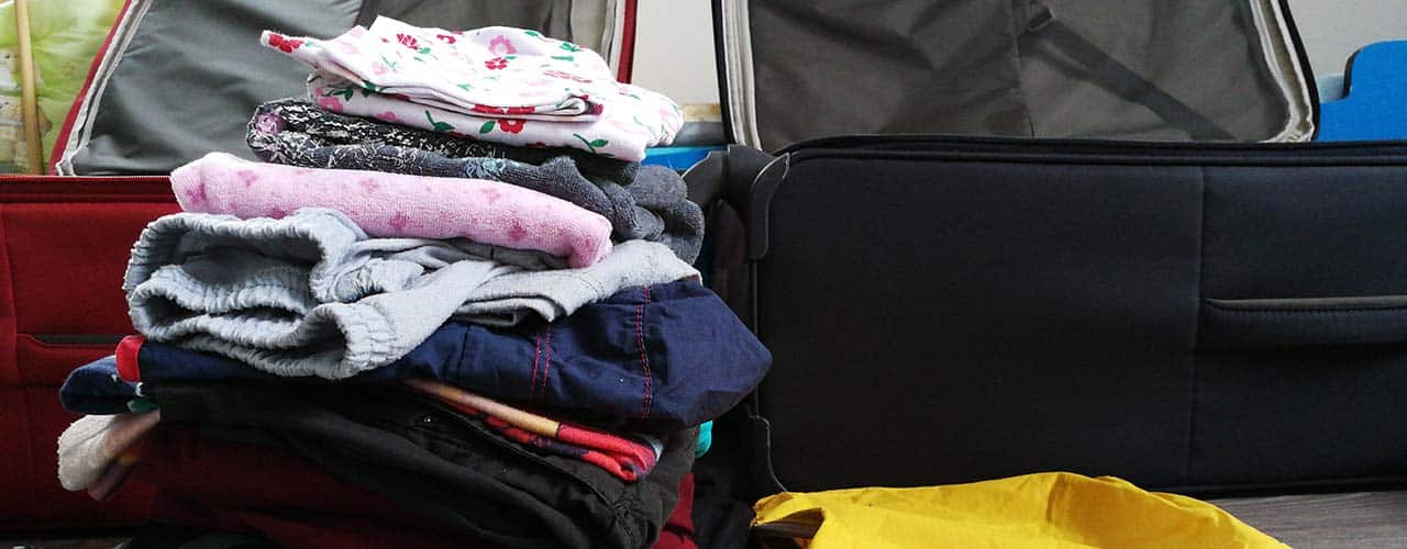 Packen mit Kindern - Wäschestapel Packen mit Kindern - Wäschestapel