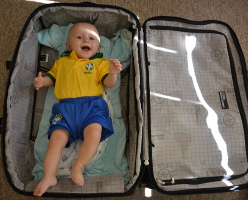 Packliste Urlaub für Kinder - Baby im Koffer